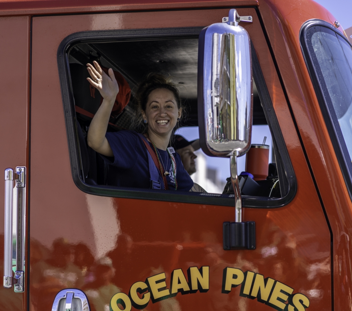 Ocean Pines Firefighter waving out the truck window
